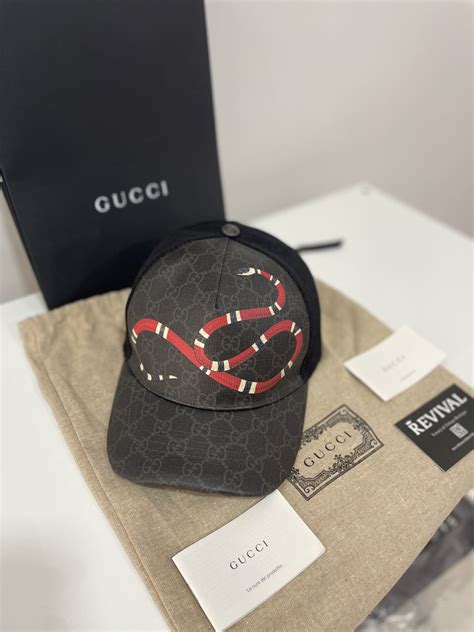 cappello gucci leone|Gucci hat snake print.